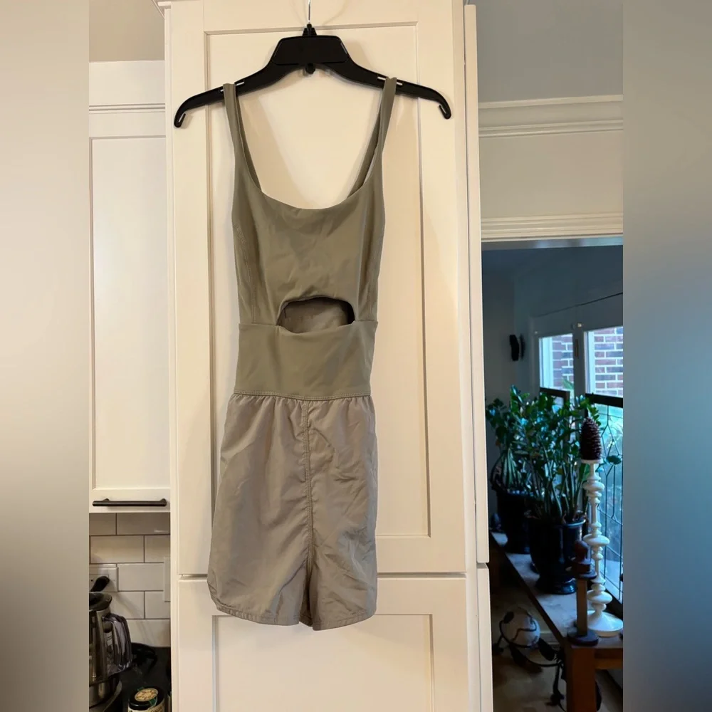 new Free People righteous runsie active romper in sage stone green